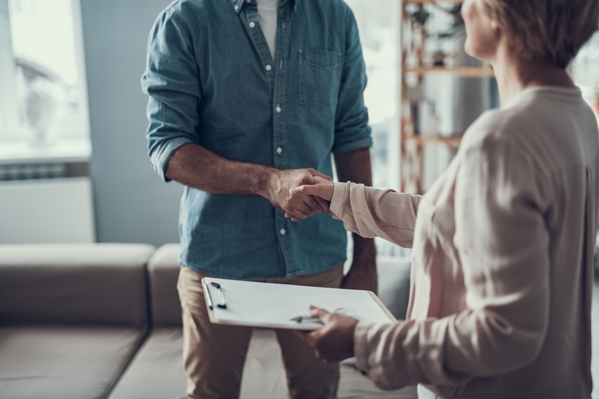 Close up of man shaking hands with his psychotherapist